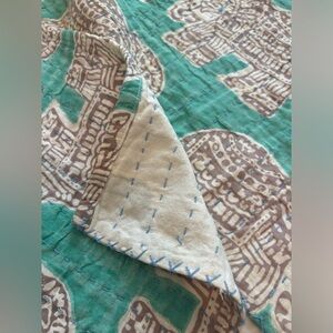 Blue/green elephant quilt